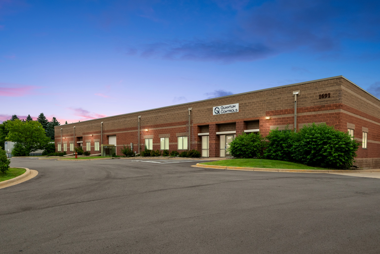Twilight view of office/warehouse building